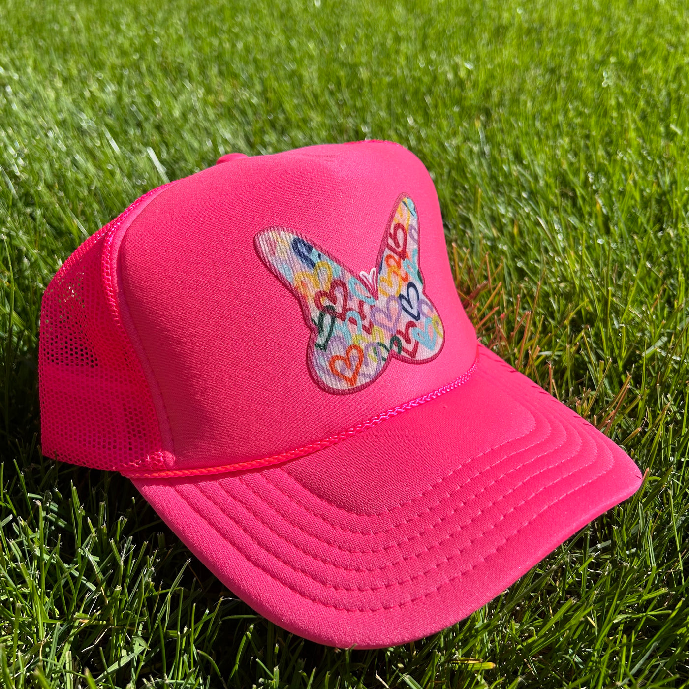 “Solid Pink Neon Butterfly" Trucker Hat